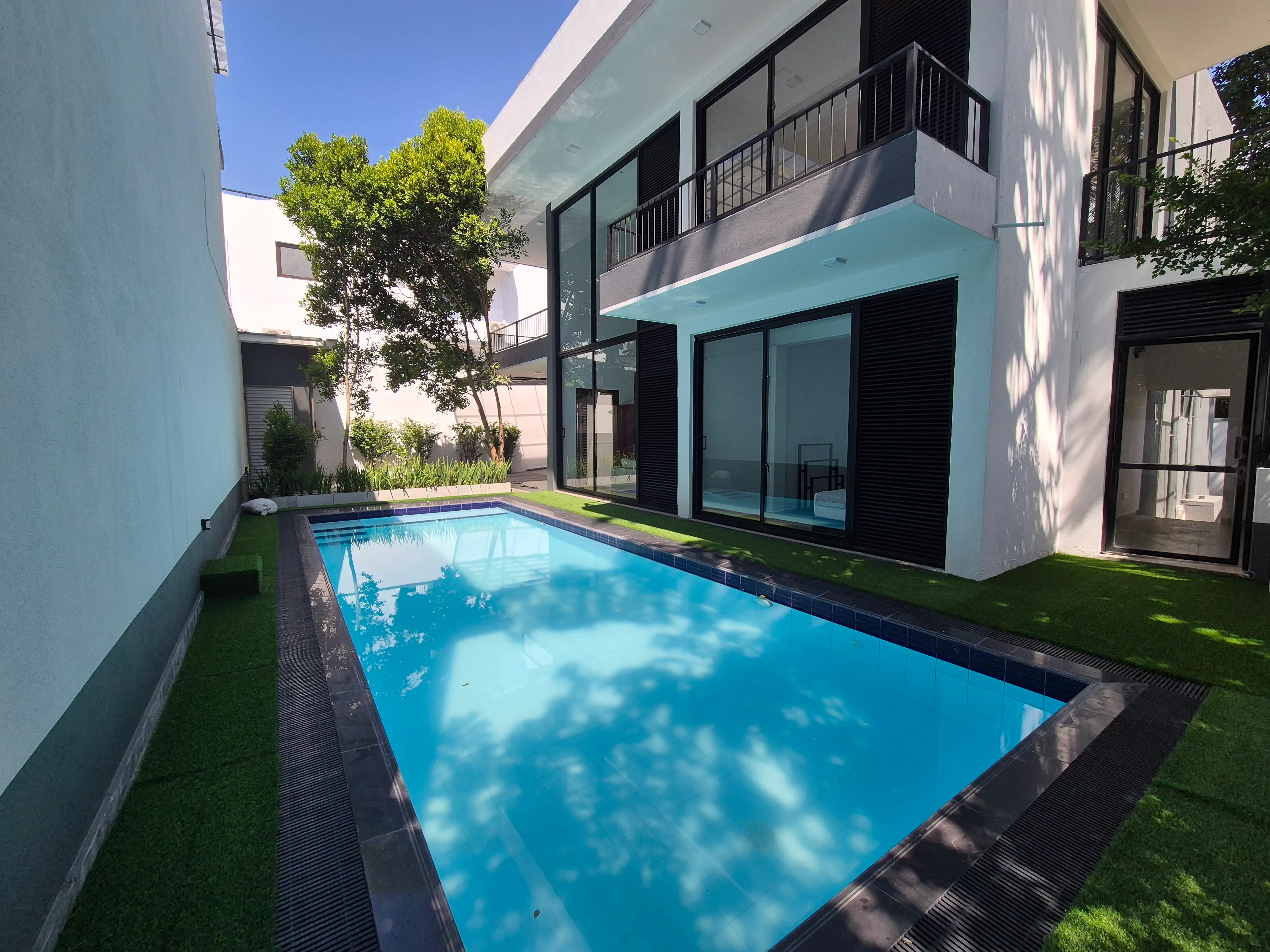 TenTwo private residence outdoor pool area with contemporary architecture Kandy Sri Lanka