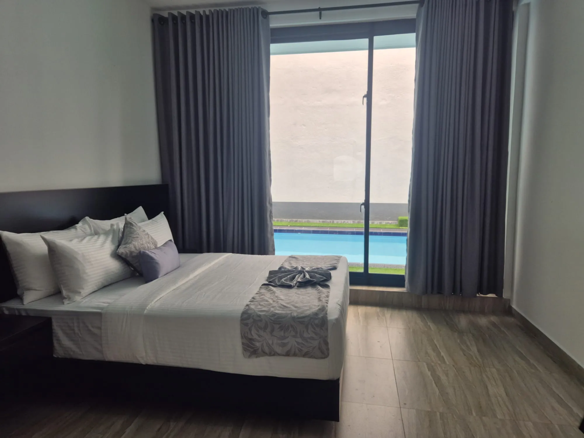 Garden suite bedroom at TenTwo with views to the surrounding landscape